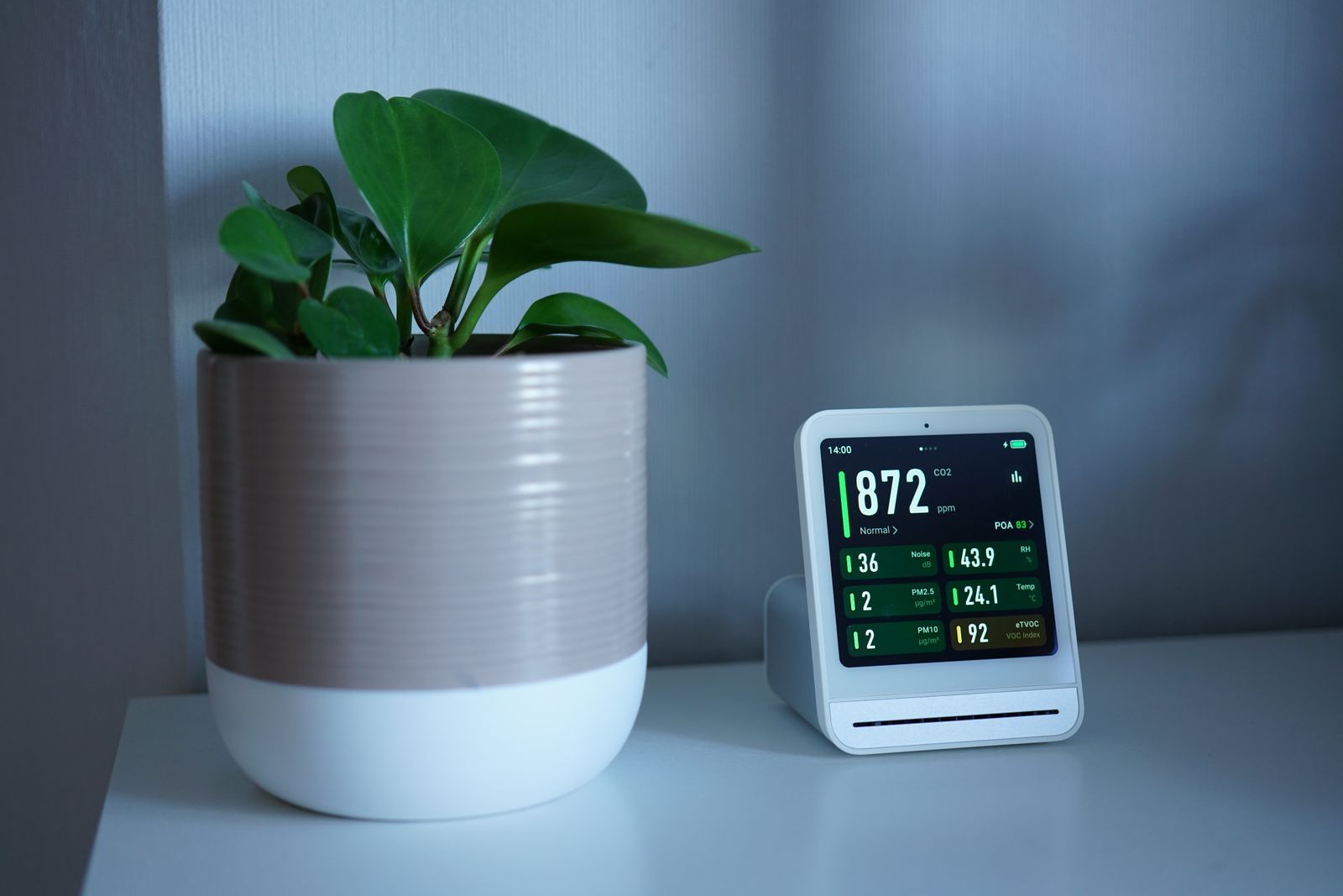 Air quality monitoring device representing radon testing context
